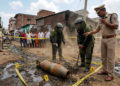 abalpur Police and Bomb Disposal Squad at the site where a bomb shell was found near scrap dealer Shamim's house.