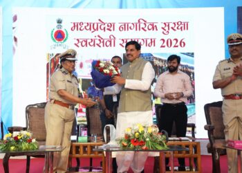 DG Home Guards Pragya Richa Srivastava welcoming CM Mohan Yadav with a bouquet at Home Guard Parade Ground, Bhopal.