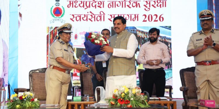 DG Home Guards Pragya Richa Srivastava welcoming CM Mohan Yadav with a bouquet at Home Guard Parade Ground, Bhopal.