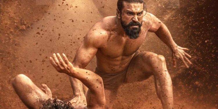 फिल्म 'पेड्डी' के एक दमदार सीन में एथलीट के रूप में नजर आ रहे सुपरस्टार रामचरण का पोस्टर।