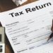 इनकम टैक्स रिटर्न (ITR) ई-फाइलिंग पोर्टल, टैक्स फॉर्म और कैलेंडर पर 31 जुलाई की तारीख दर्शाती प्रतीकात्मक तस्वीर।
