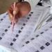 भारत निर्वाचन आयोग (ECI) के पोर्टल पर नया मतदाता पंजीकरण फॉर्म-6 और मतदाता पहचान पत्र की प्रतीकात्मक तस्वीर।