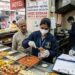 Indore Bypass Road par sthit dhabe ke kitchen mein food safety inspection karti FDA aur swasthya vibhag ki team.
