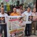 इंदौर के प्रमुख बाजार में काले कपड़े से ढके यूपीआई क्यूआर कोड स्कैनर और नो यूपीआई डे के समर्थन में लगे पोस्टर।