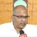 भारत निर्वाचन आयोग के प्रतीक चिन्ह के साथ ओडिशा के मुख्य चुनाव अधिकारी (CEO) आर. संथान गोपालन की फाइल तस्वीर।